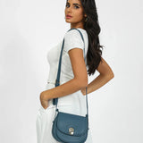 شنطة كروس بدي جلد بحزام قابل للتعديل لون تركواز - g