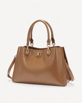 شنطة جلد ناعم بمقبض وحمالة كتف لون بني - 1