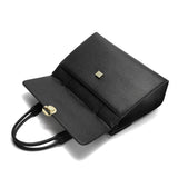 A large, elegant black women's handbag for work.