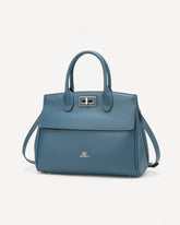 شنطة كتف جلد طبيعي بحامل قابل للتعديل لون تركواز - 1