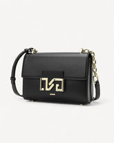 شنطة كتف جلد طبيعي بحزام لون اسود مطفي - 1