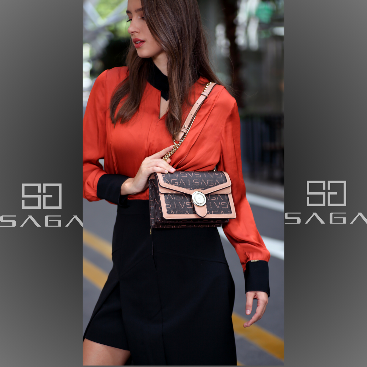 A luxurious women's handbag with a modern design, 23 cm wide, coffee brown colour