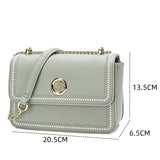 An elegant bag embroidered with crystals for attractiveness, width 20.5 cm, in apple green color