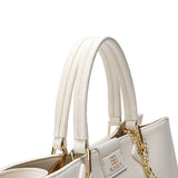 An elegant handbag with a wide cushion, 32 cm wide, in brown or cream color