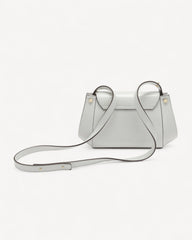 Practical handbag and shoulder bag - elegant design in a luxurious creamy white color with gold accessories