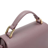 Small women's handbag in mauve color with top handle and shoulder strap