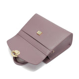 Elegant women's handbag in mauve color with a top handle and practical design