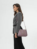 Elegant women's shoulder bag in mauve with gold metallic details