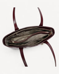 Luxurious maroon lined leather handbag and shoulder bag - a feminine touch that highlights your elegance