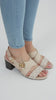 Block heel sandal - elegant beige design with a modern print and a golden touch